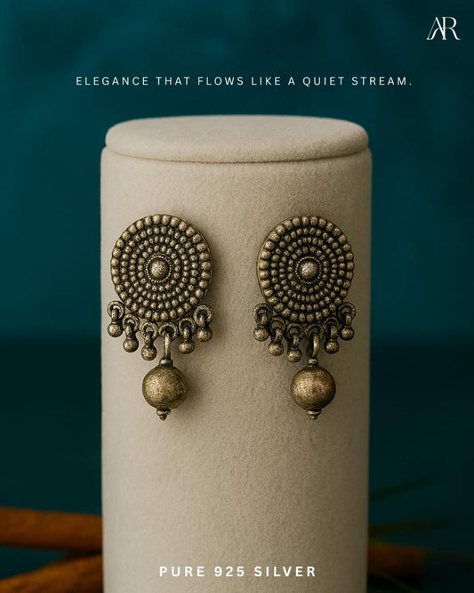 Handcrafted 925 silver oxidized earrings with antique round design & jhumka drop. Perfect for festive wear & daily elegance. Shop AR Jewellery online.