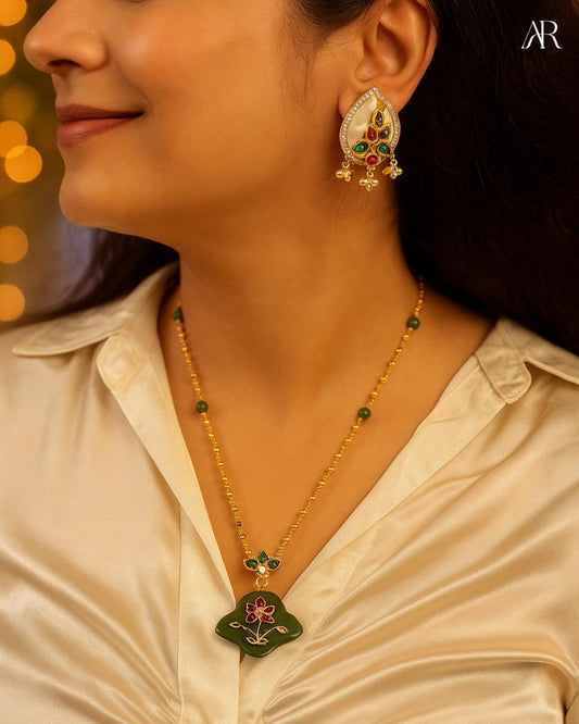 Sterling silver Verdant Bloom pendant necklace with green stone, gold-tone chain, and floral enamel design – AplusR Jewelry”